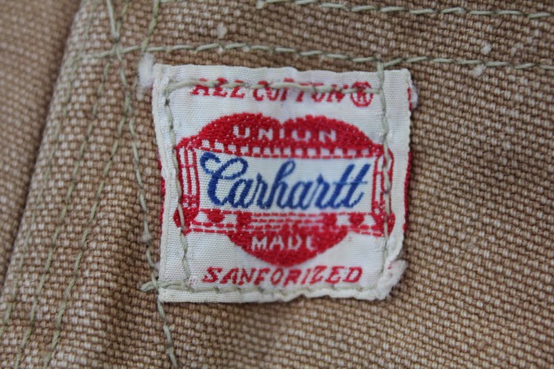 Close-up of a Carhartt Union Made circular label sewn into a garment