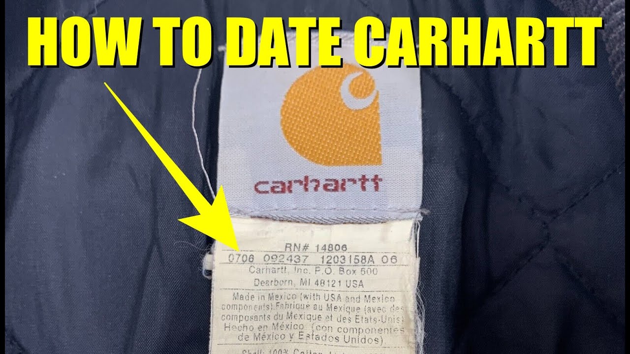 A white Carhartt care tag printed with a style number and fabric code