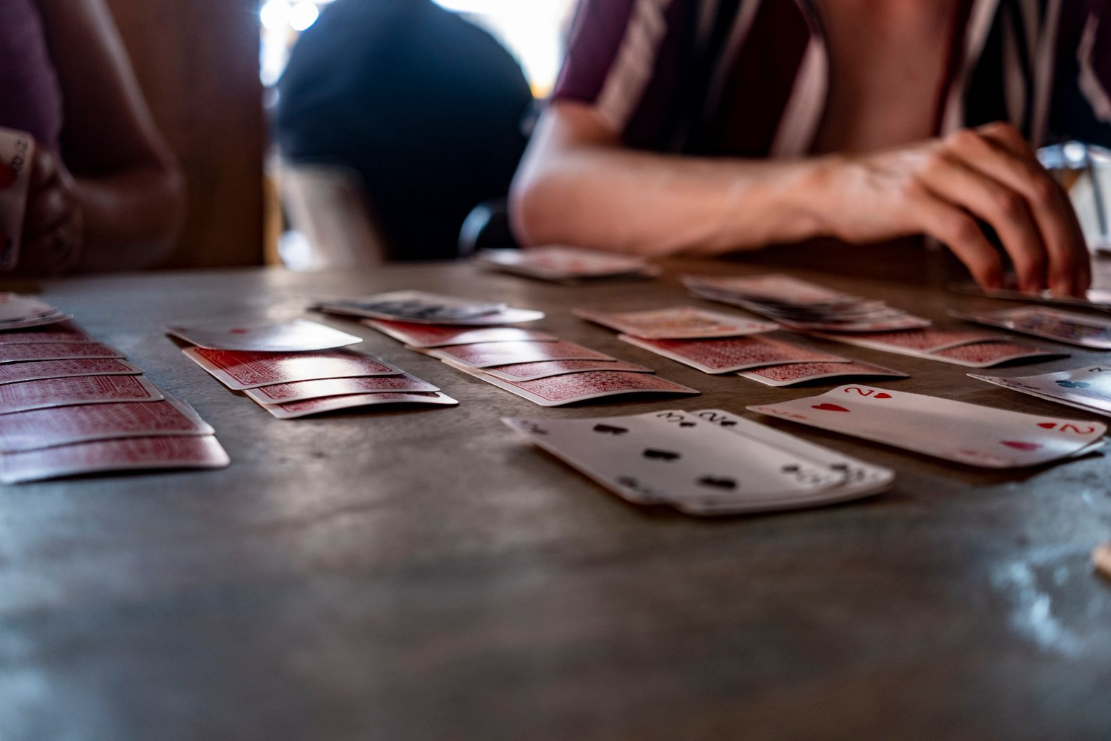 Collectible trading cards spread out on a table